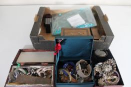 A box of wooden money box containing pre decimal British and foreign coins,