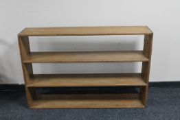 A set of antique pine open bookshelves