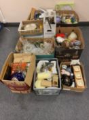 A pallet of nine boxes of bric a brac, glass ware, serving trays,