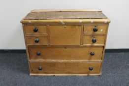 A Victorian pine six drawer chest
