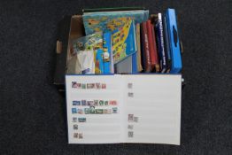 A box of stamp albums, stamps of the world,