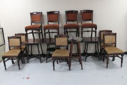 Four square topped bar tables in an oak finish together with nine pub chairs and a bar stool