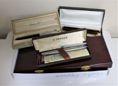 A box of containing a set of twelve Chinese Zodiac coins, Harmonica,