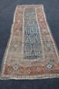 A 19th century Persian runner of geometric design,