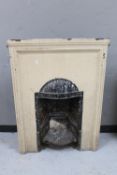 A Victorian cast iron fire place
