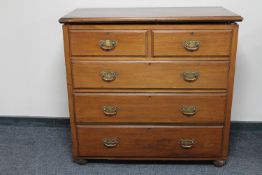 A mahogany five drawer chest of bun feet (one missing)