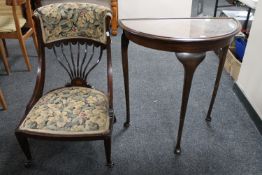 A Victorian inlaid mahogany spoon backed bedroom chair upholstered in floral fabric together with a