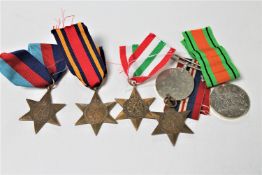 A group of WWII medals comprising War Medal, Victory Medal, 1939-45 Star, Italy,