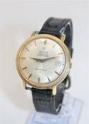A gent's gold plated and stainless steel Omega Constellation automatic centre seconds calendar