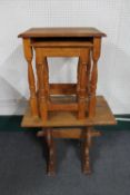 An oak side table and nest of two oak tables