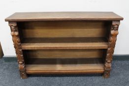 A set of twentieth century carved oak low bookshelves