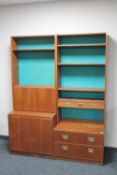 A mid 20th century teak twin section bureau bookcase