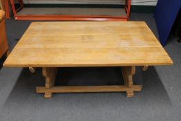 A blond oak refectory coffee table