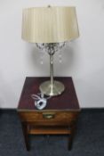 A mahogany ship's style lamp table with brass mounts together with a table lamp and shade