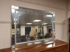 A contemporary all glass mirror,