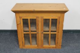 A pine double door cabinet