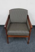 A twentieth century Danish wooden framed armchair