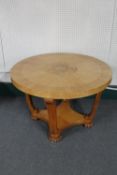 A circular Art Deco coffee table