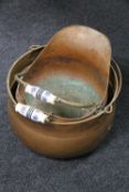 An antique copper coal receiver and a copper swing handled cooking pot