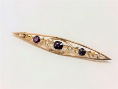A Victorian almandine garnet and pearl brooch