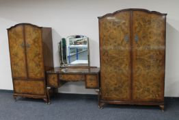 A three piece mid twentieth century Golden Key walnut bedroom suite