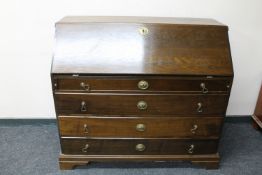 A 20th century continental oak bureau