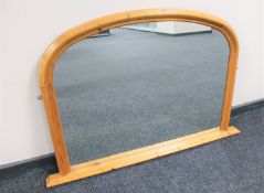A pine framed overmantel mirror
