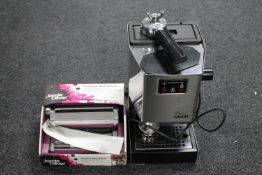 A Gaggia Classic coffee maker and a Jamie Oliver pasta machine