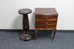 A mahogany Queen Anne style three drawer bedside chest together with a mahogany torchere