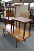 A mid 20th century teak coffee table,