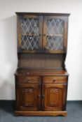 A reproduction oak dresser