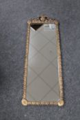An ornate gilt framed mirror