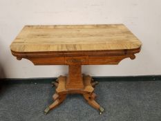 An early 19th century rosewood card table,