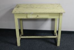 An antique painted pine table
