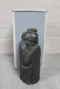 A matt glazed Lladro figure of a Chinese elder