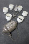 A contemporary ceiling light and a metal hanging lantern