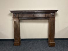 A reproduction oak fire surround