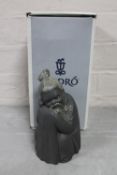 A matt glazed Lladro figure of a Chinese elder