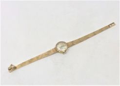 A Lady's gold Rolex precision watch on gold strap