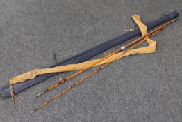 Two antique cane fishing rods