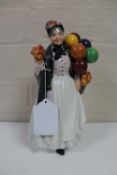 A Royal Doulton figure : Biddy Penny Farthing HN 1843
