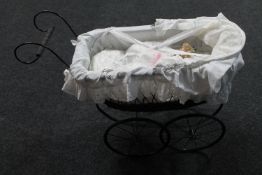 An antique style doll's pram