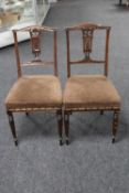 A pair of Edwardian bedroom chairs