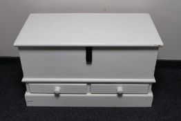 An antique style painted pine storage box