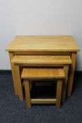 An oak nest of tables