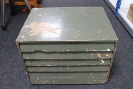 A wooden multi drawer chest and a metal chest containing tools