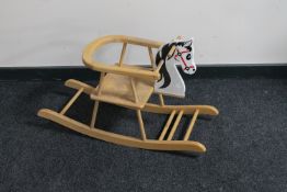 A child's nursery rocking horse
