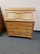 A light oak bureau,