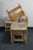 A nest of three bamboo and wicker tables,