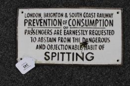 A metal railway sign : London,